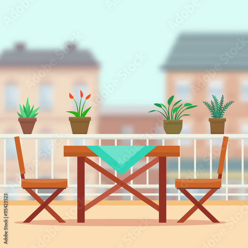 Table and chairs on the balcony.