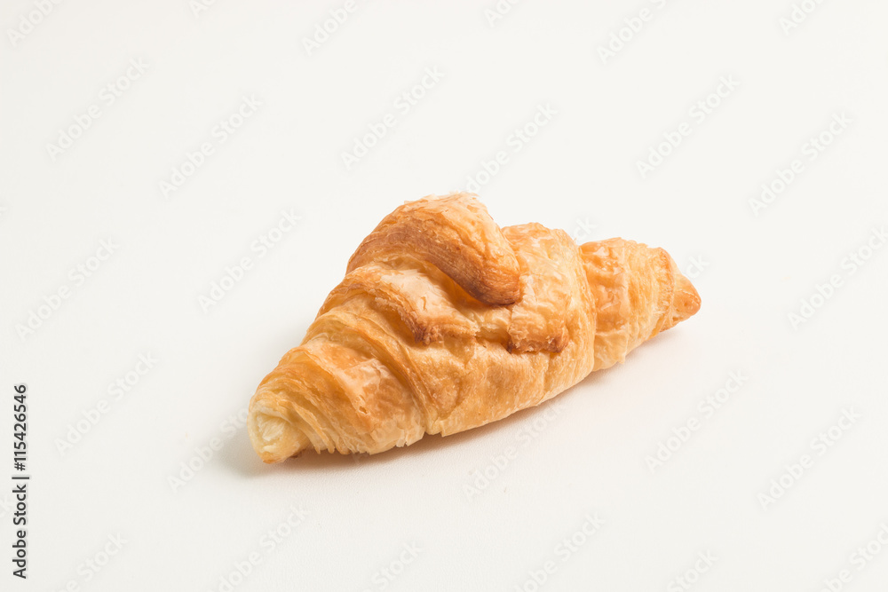 gold croissant isolated on white background
