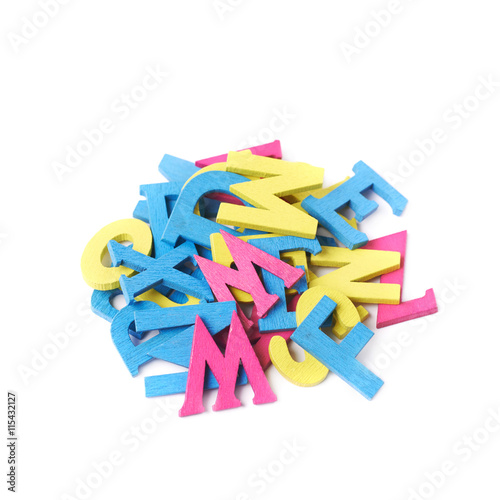 Pile of painted wooden letters isolated