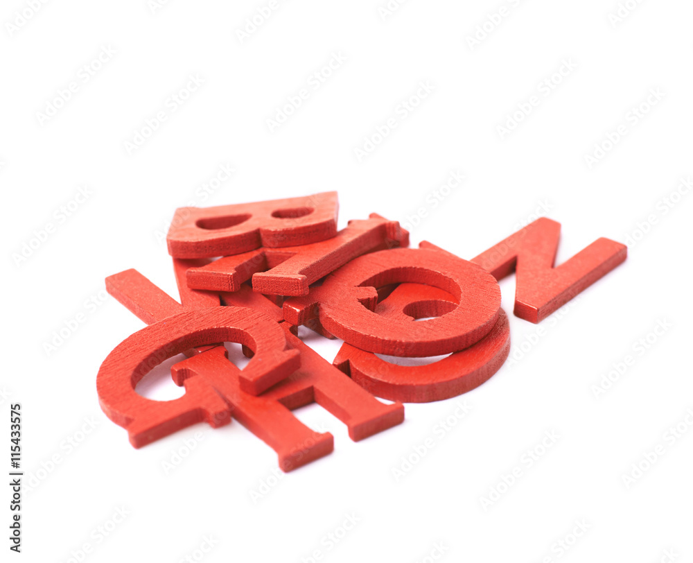 Pile of colorful wooden letters isolated Pile of colorful wooden letters isolated