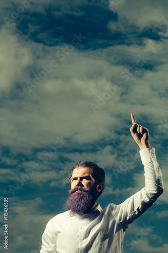 bearded man with blue beard on sky