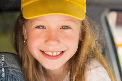 Portrait of beautiful happy little girl closeup