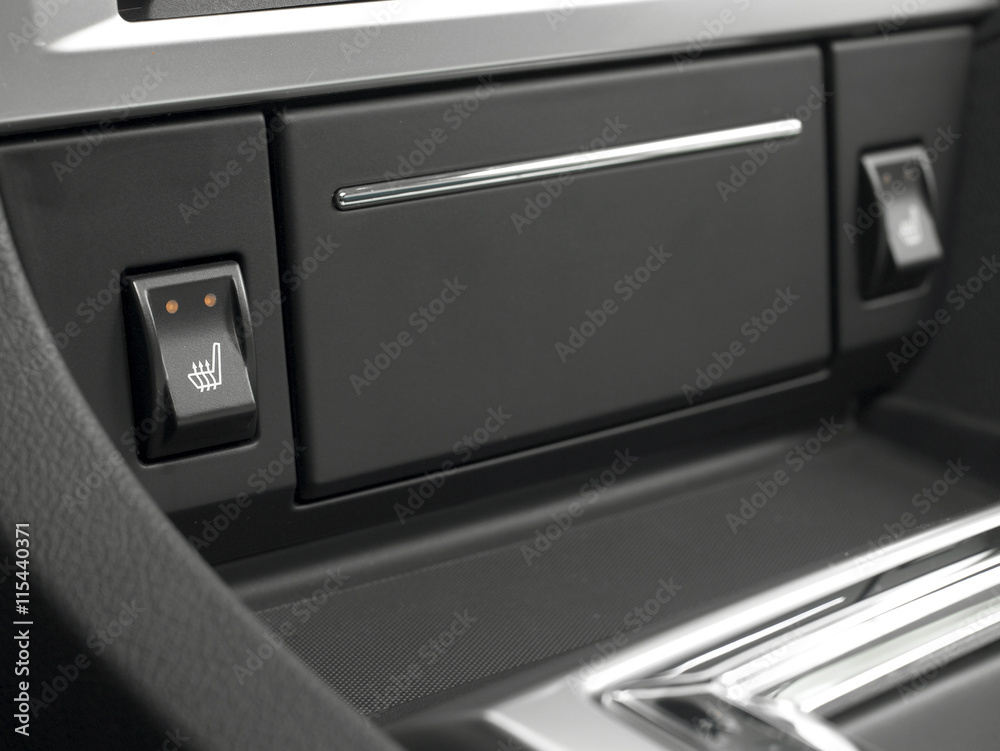 Close-up of black buttons on car details
Close-up of black buttons on car details