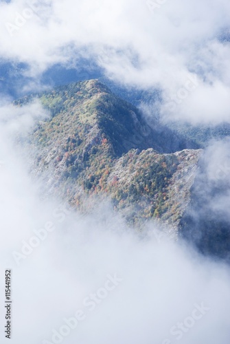 Fog revealing the mountain range