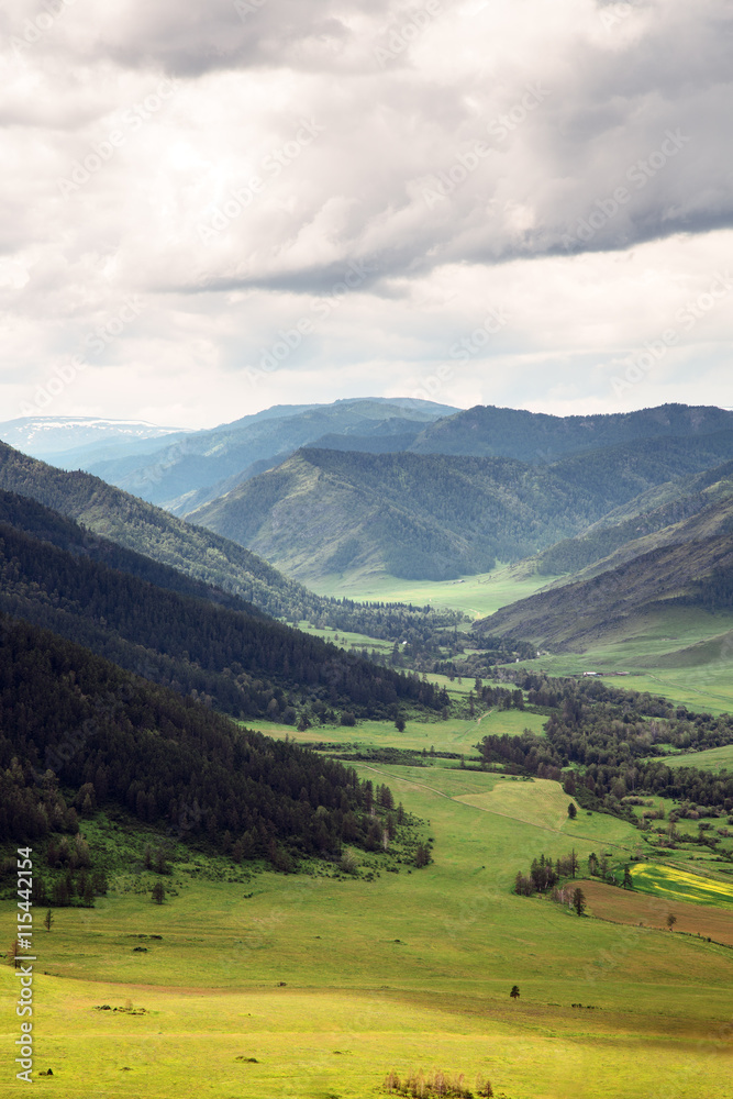 Beautiful Landscape. Mountains And Green Valley