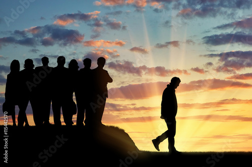 Bilde på lerret Silhouettes of people crowd expel the man from their community.