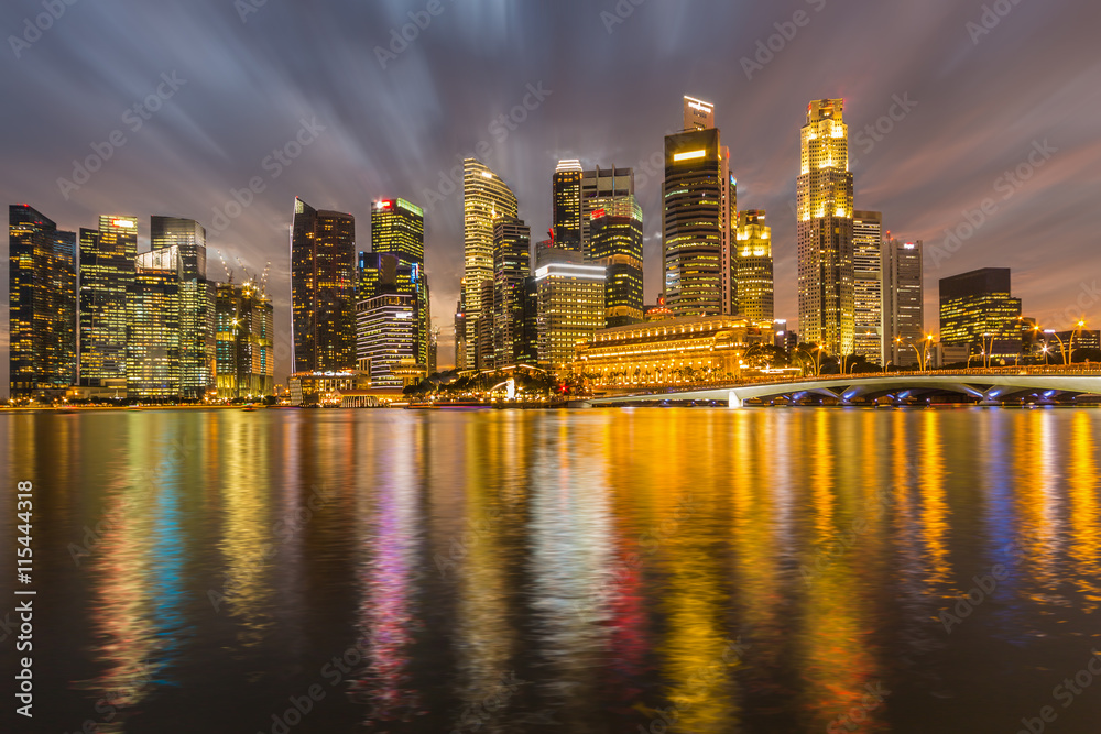 Fototapeta premium High building and water reflection at twilight time.
