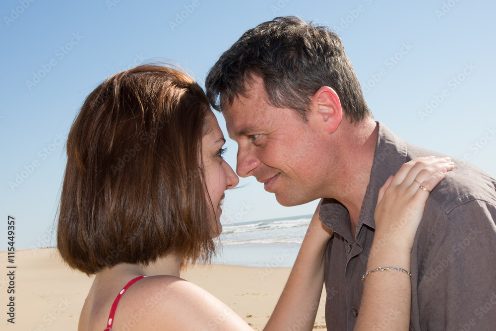 Young couple in love, attractive man and woman enjoying
