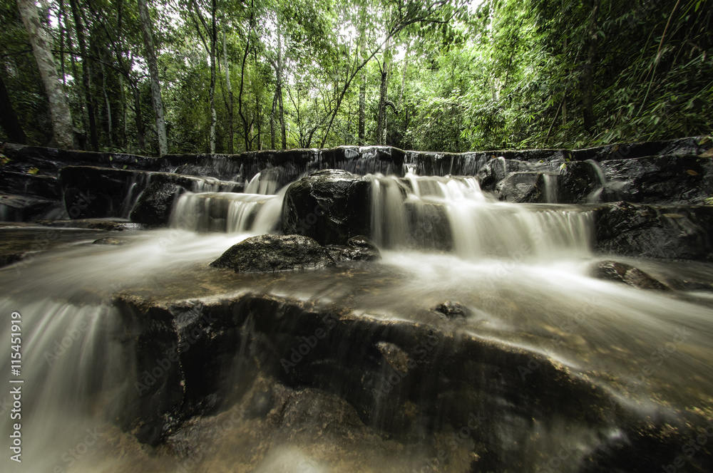 A beautiful waterfall shot with a slow exposure A beautiful waterfall shot with a slow exposure