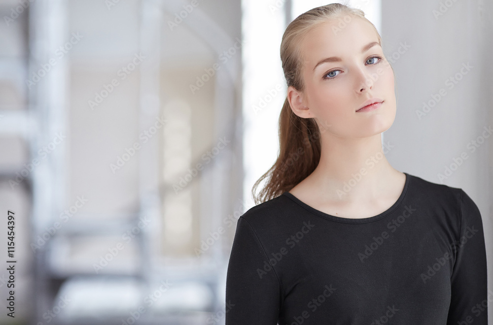 Blond woman in a black dress. Blond woman in a black dress.