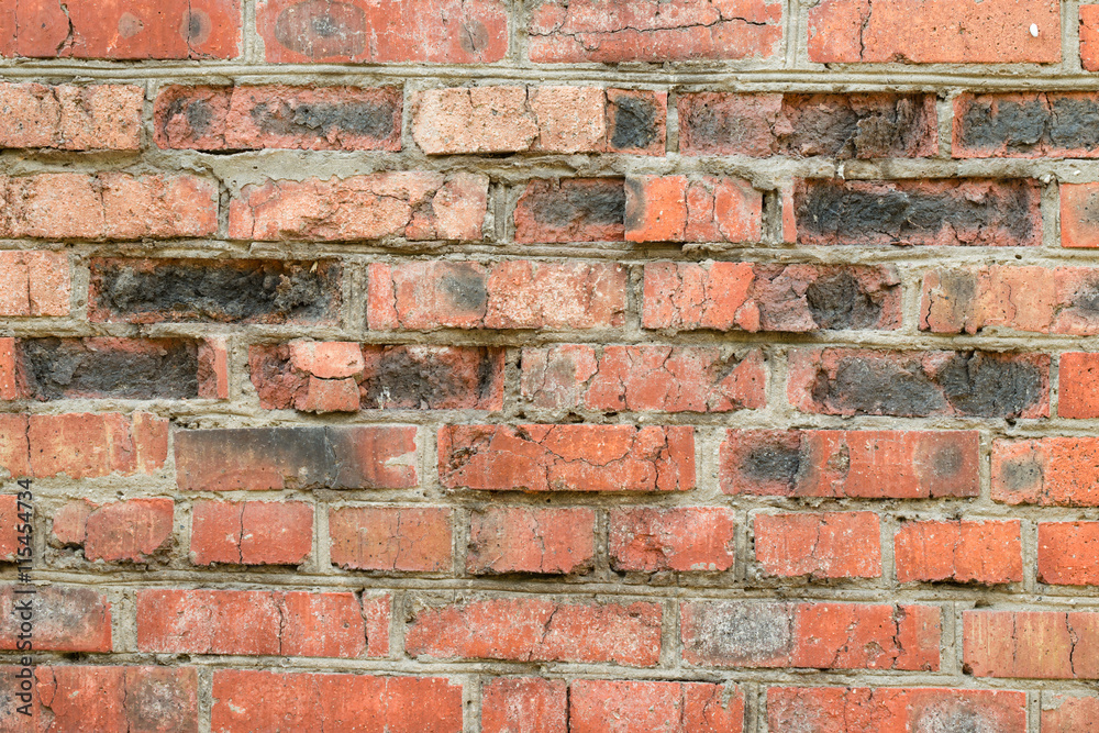 Naklejka premium Brick texture with scratches and cracks