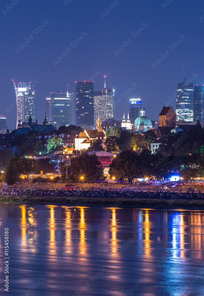 Night view of Warsaw waterfront and downtown skyline