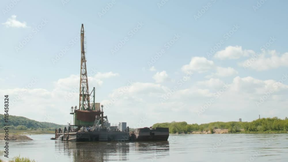 2016 May 20, Kaunas, Lithuania. Nemunas river near the castle going dredging works. 2016 May 20, Kaunas, Lithuania. Nemunas river near the castle going dredging works.