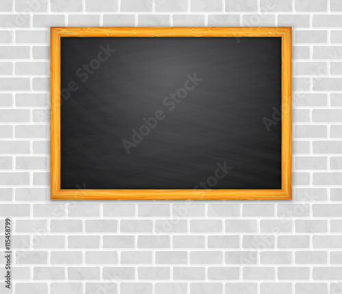 Blackboard on brickwall background