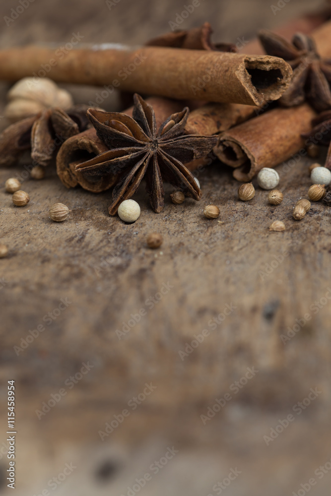 Spices lying on a wooden surface closeup