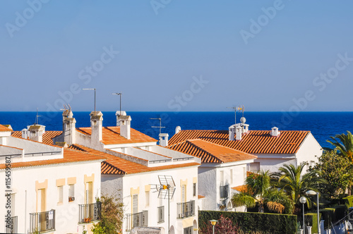  Chalets beside the sea. Summer vacations concept.