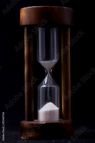 sand falling in hour glass
