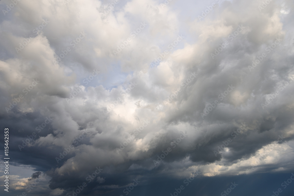 Heavy white and grey clouds gathering before rain