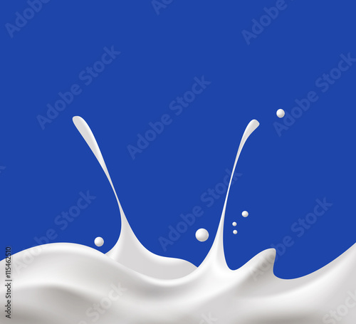 milk splash on blue background
