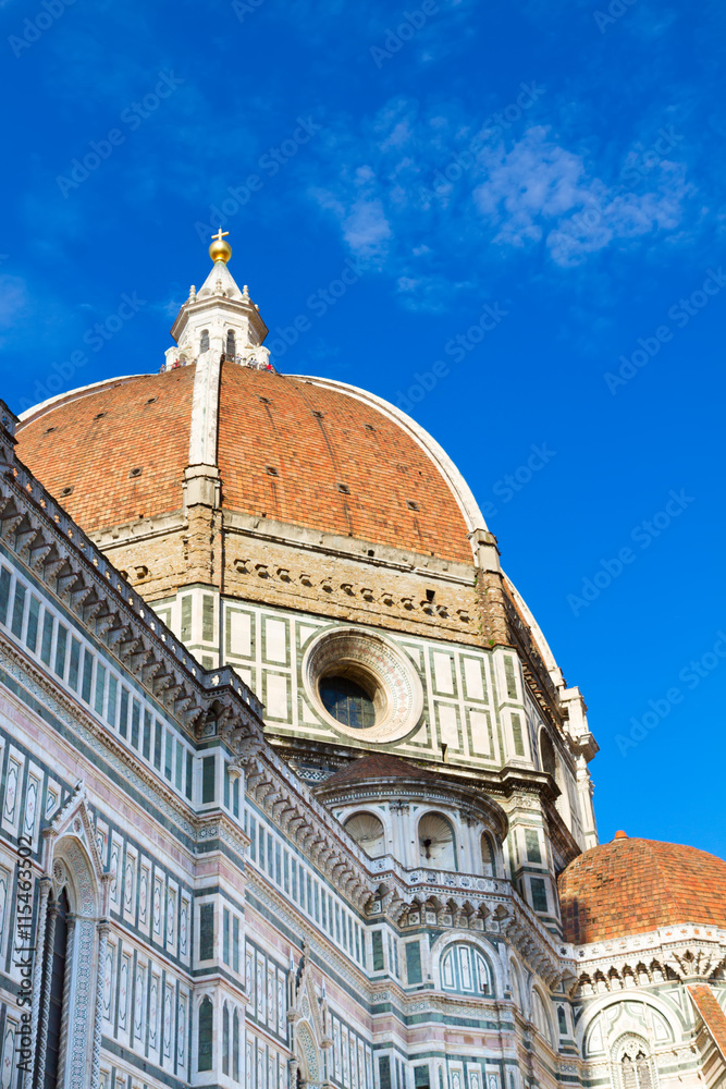 Dome of cathedral church Santa Maria del Fiore over blue sky, Florence, Italy