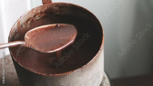 Making chocolate dough for brownie - stirring cocoa dough mixture
