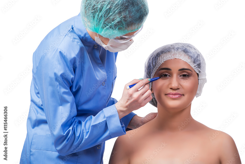 Young woman preparing for plastic surgery isolated on white Young woman preparing for plastic surgery isolated on white