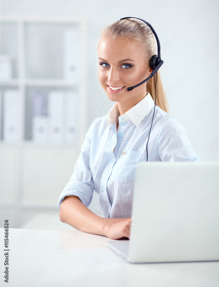 Close-up portrait of a customer service agent sitting at office Close-up portrait of a customer service agent sitting at office