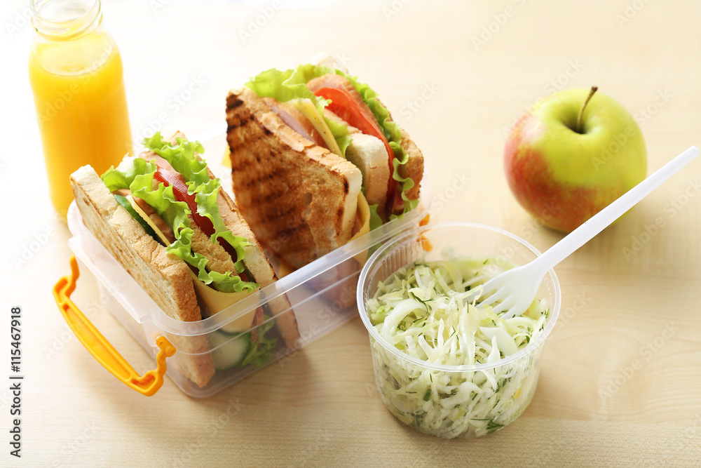 Tasty and fresh sandwiches on a brown table Tasty and fresh sandwiches on a brown table