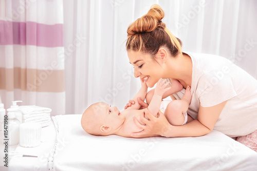 Mother and her baby on chan...