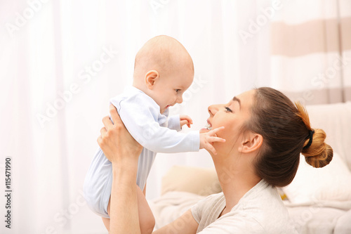Mother and her little baby ...