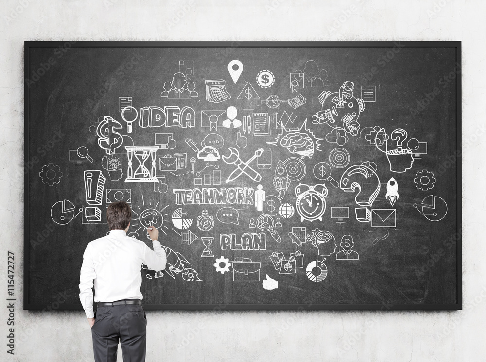 Businessman drawing business sketch Businessman drawing business sketch