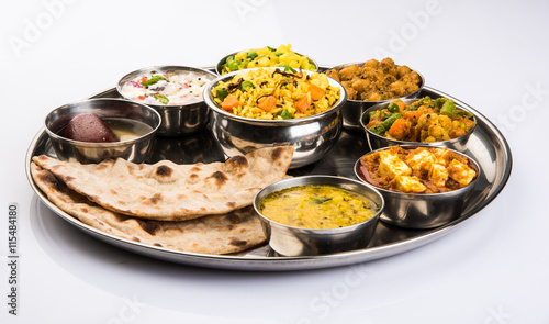 indian food platter, indian thali, indian veg thali,paratha, rice, aalu bhaji,puri or poori, complete meal, south indian thali