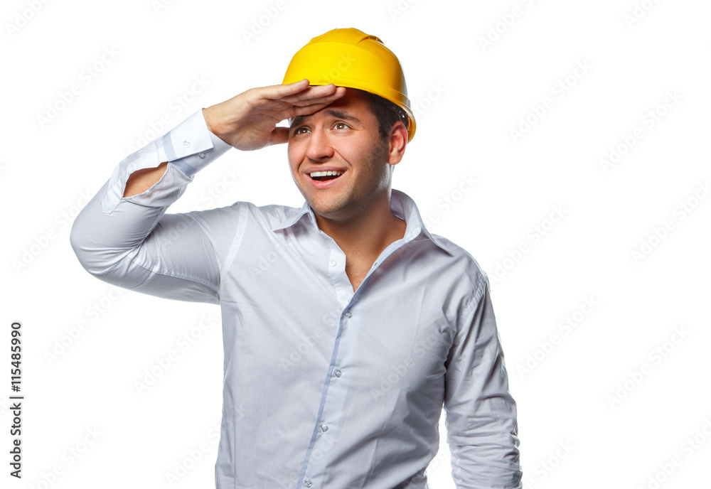 Portrait of positive worker male in yellow safe helmet. Portrait of positive worker male in yellow safe helmet.