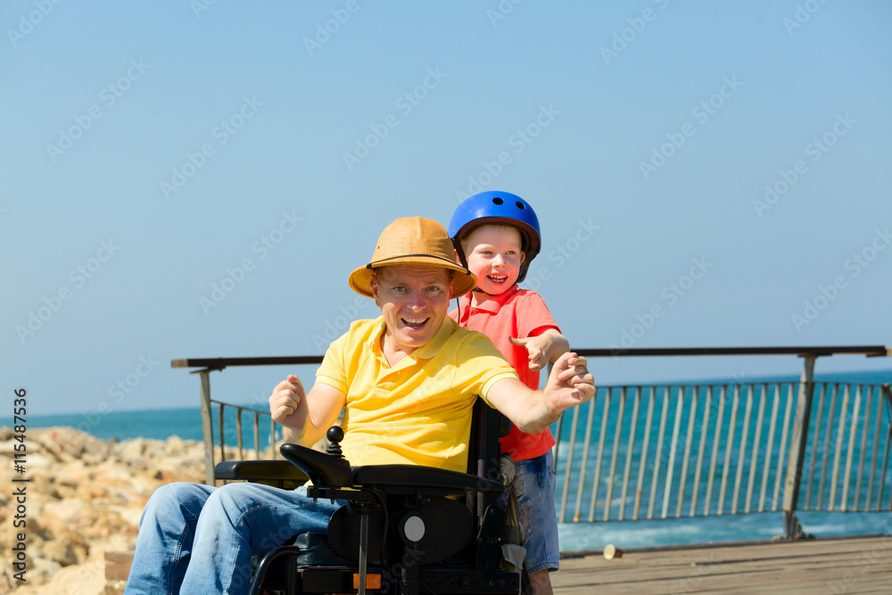 Disabled Father play with his little son