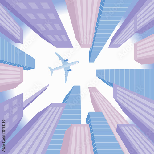 Airplane flying over business skyscrapers