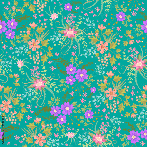 Seamless ditsy. Floral pattern. Flowers background. Vector illustration. Multicolored flowers on green background.