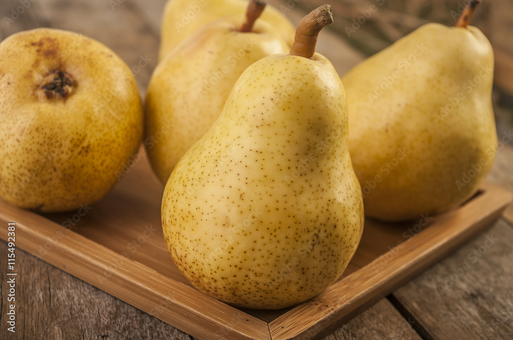 Fruit background. Fresh organic pears on old wood. Pear autumn harvest Fruit background. Fresh organic pears on old wood. Pear autumn harvest