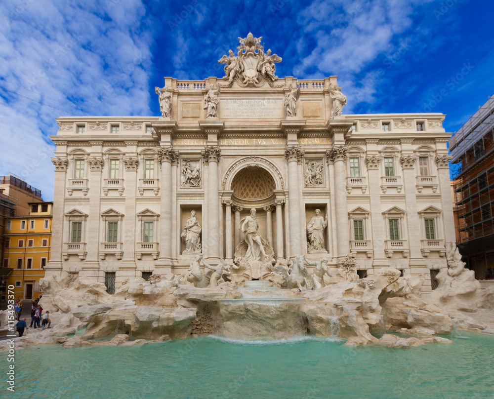 restored facade of famous Fountain di Trevi in Rome at day, Italy