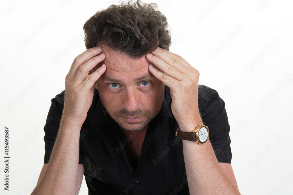 Naklejka premium Man having a headache isolated on white