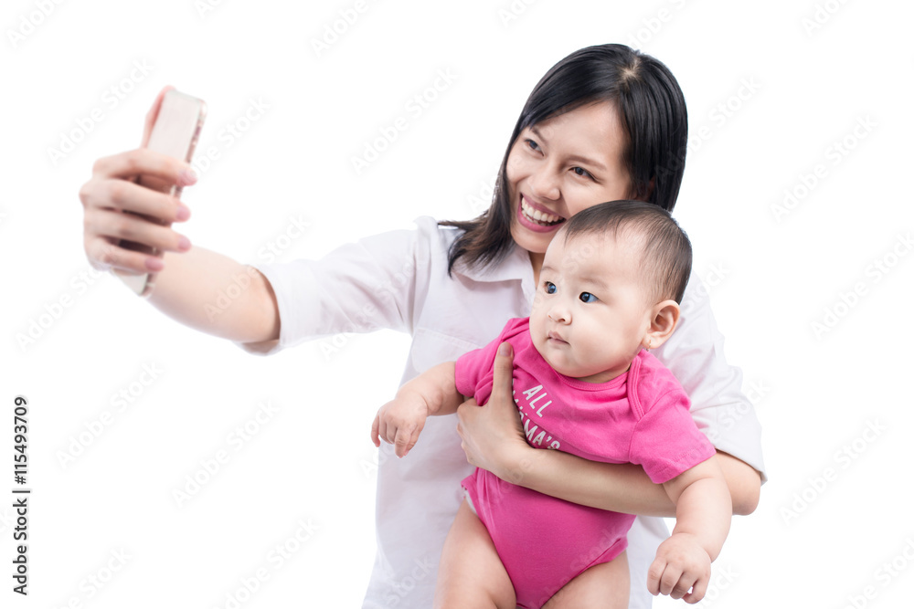 Funny baby girl looking at the camera and smiling, make selfie Stock Photo  | Adobe Stock