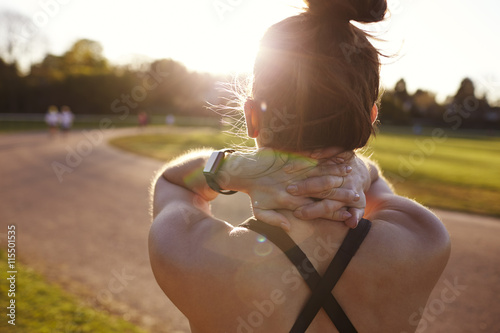 Rear view of woman excising outdoors
