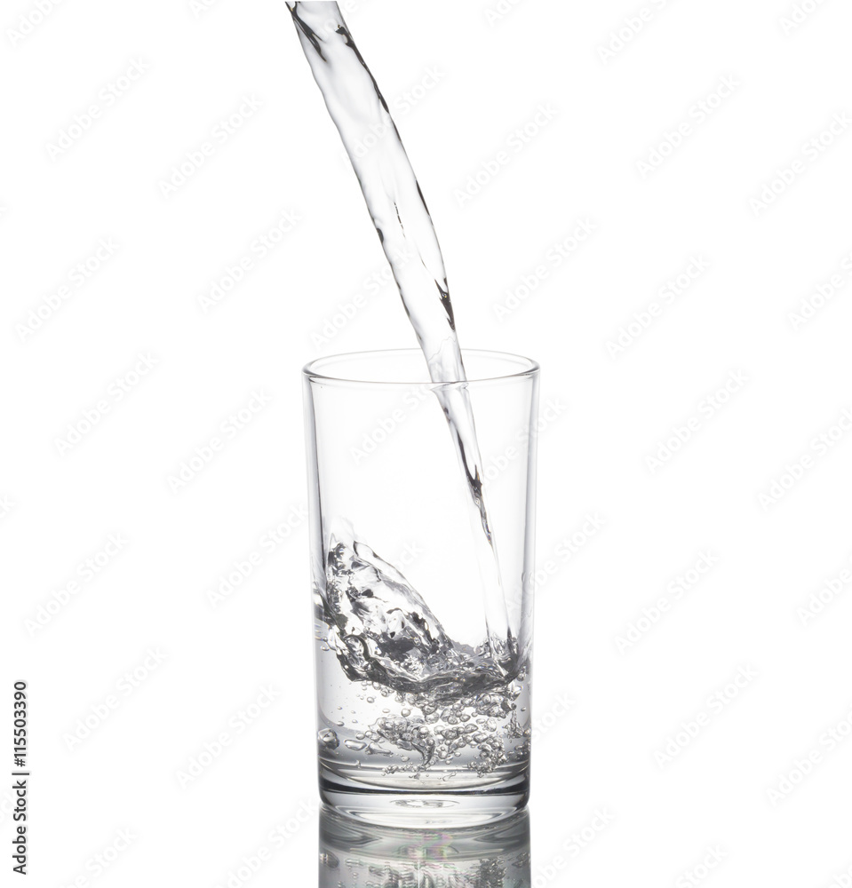 Water poured in a glass transparent white background Water poured in a glass transparent white background