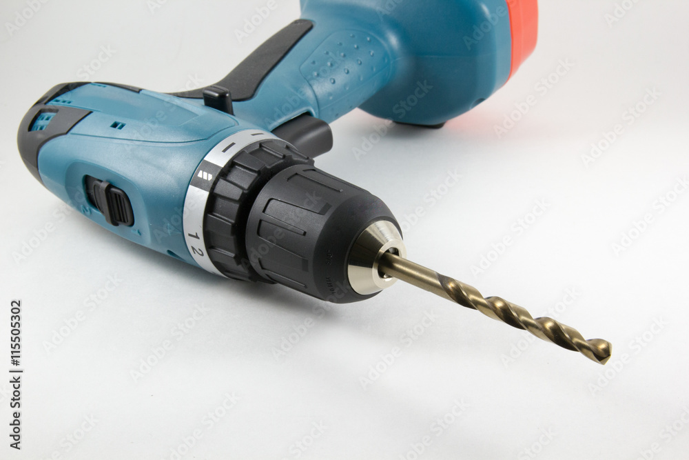 Cordless screwdriver with a drill on a white background Cordless screwdriver with a drill on a white background