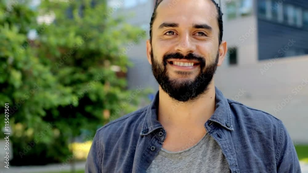 happy smiling man with beard on city street 21