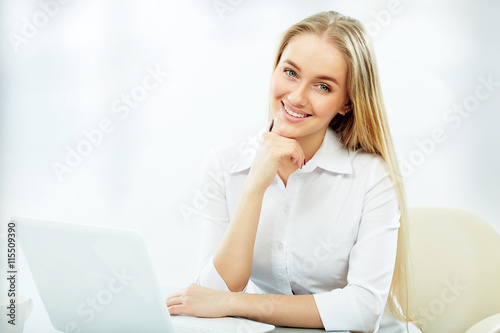 Young business woman with notebook