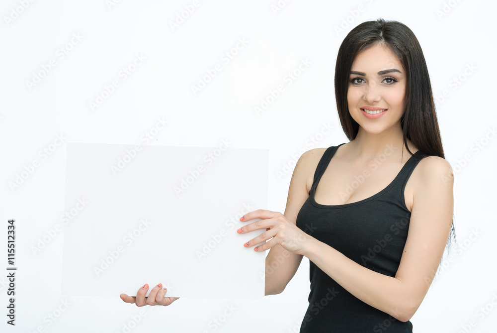 Young smiling woman show blank card or paper Young smiling woman show blank card or paper