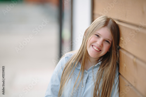 Portrait of young happy smiling girl