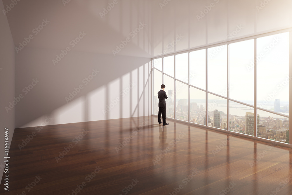 Fototapeta premium businessman looking on city