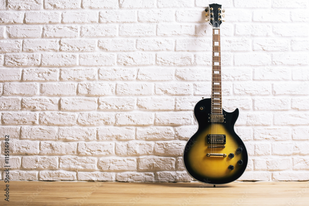 Obraz premium Electric guitar in white interior