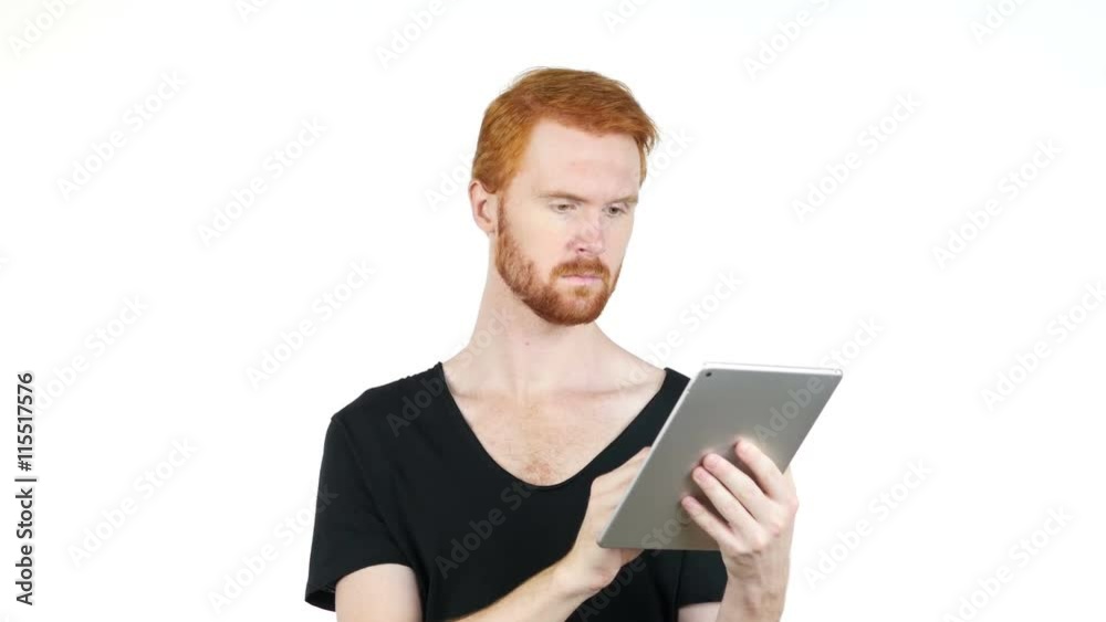 Young modern man using digital tablet Young modern man using digital tablet
